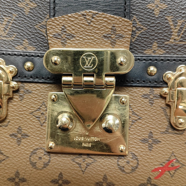 TRUNK Monogram Coated Canvas Brown