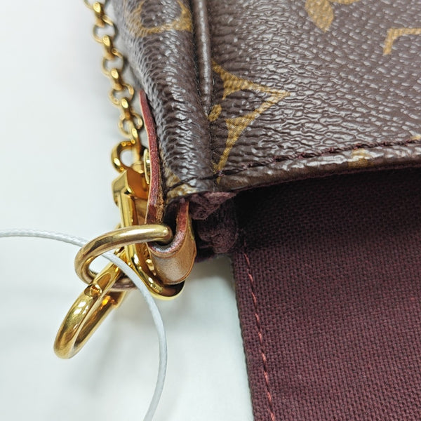 FAVORITE PM Coated Canvas Brown