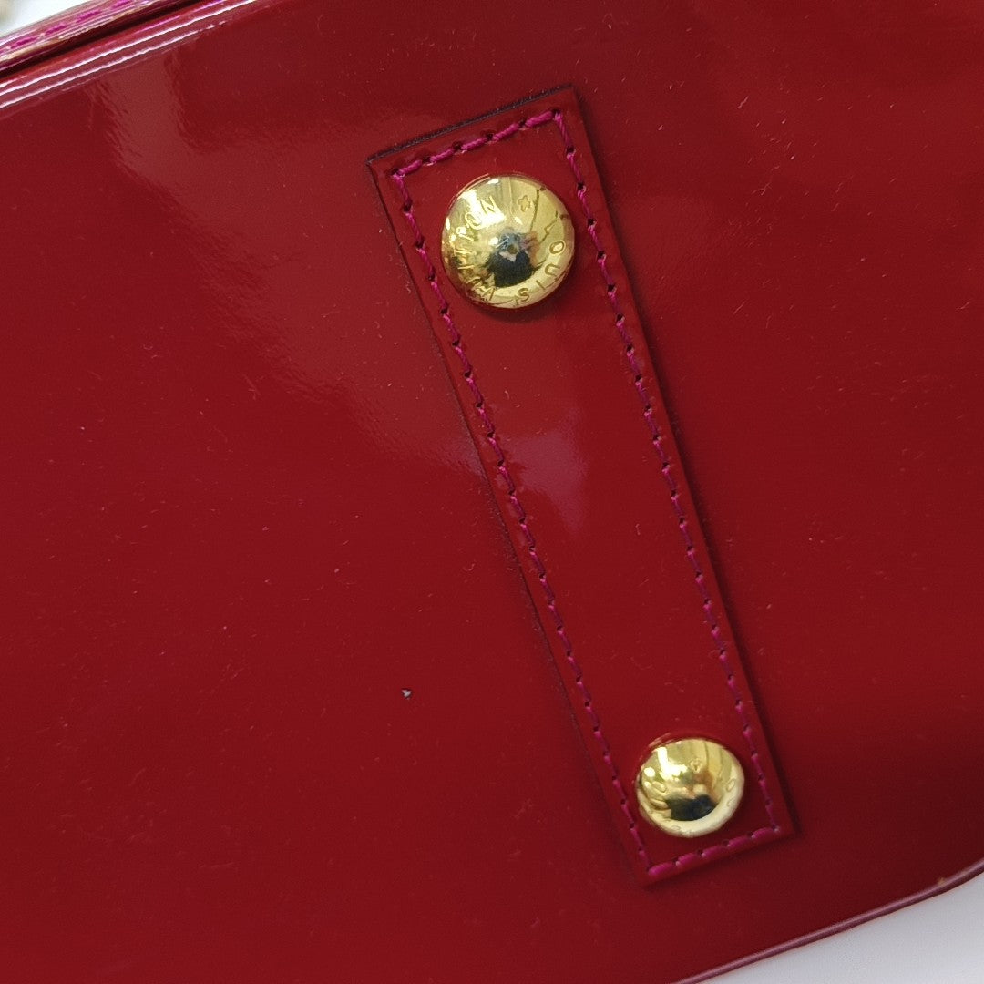 ALMA PM Piel Charol Monogram Roja