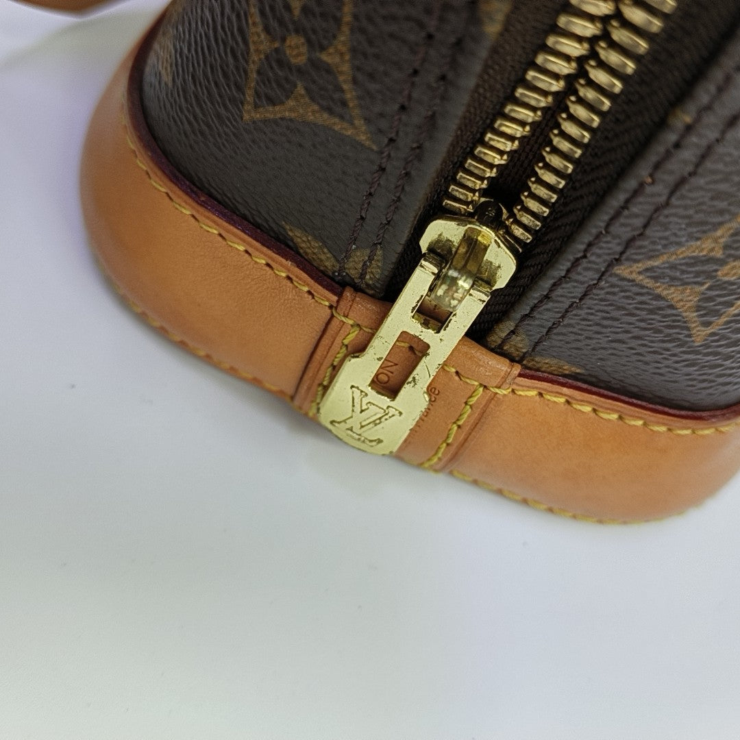 ALMA BB Monogram Coated Canvas Brown