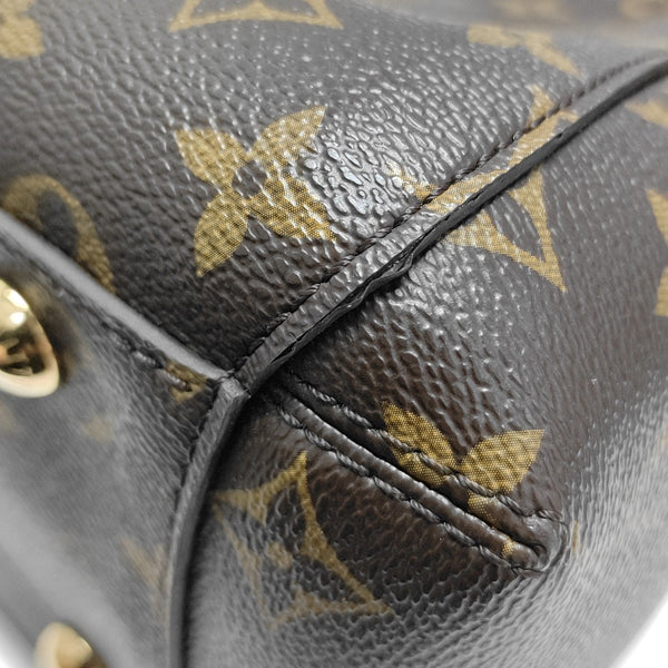 MONTAIGNE GM Monogram Coated Canvas Brown