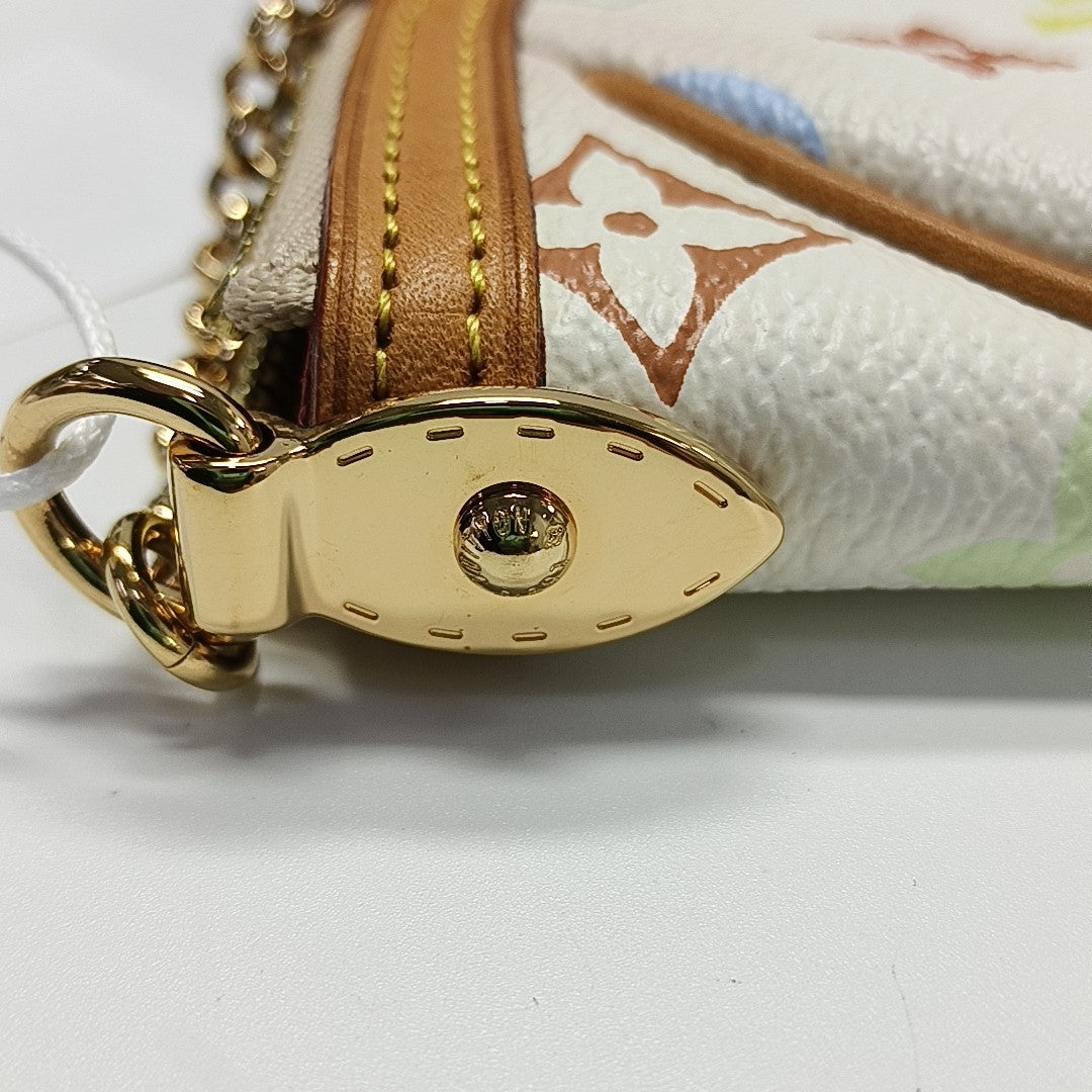 LV × TM VINTAGE MILLA Monogram Coated Canvas White
