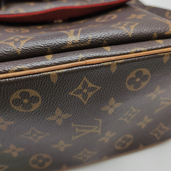 EXCENTRI-CITE Monogram Coated Canvas Brown
