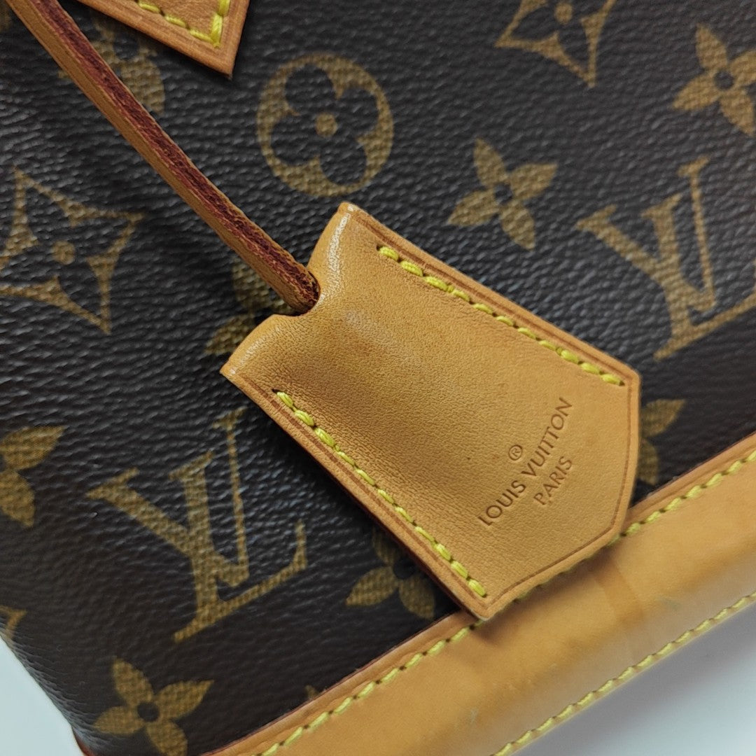 ALMA BB Monogram Coated Canvas Brown