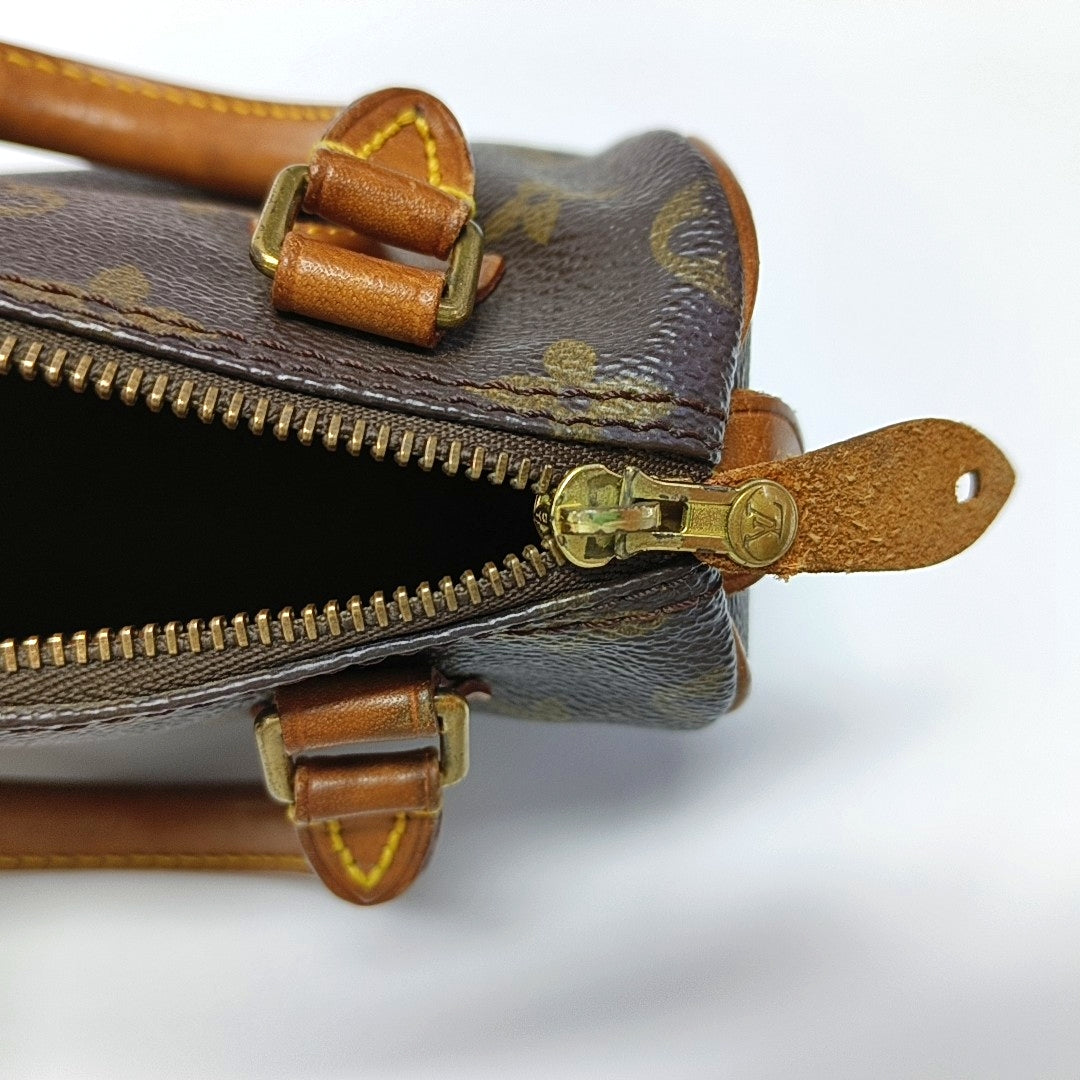 Authenticated pre-owned  SPEEDY Nano Monogram Coated Canvas Brown - Top Handle Bag at Looply
