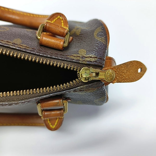 Authenticated pre-owned  SPEEDY Nano Monogram Coated Canvas Brown - Top Handle Bag at Looply