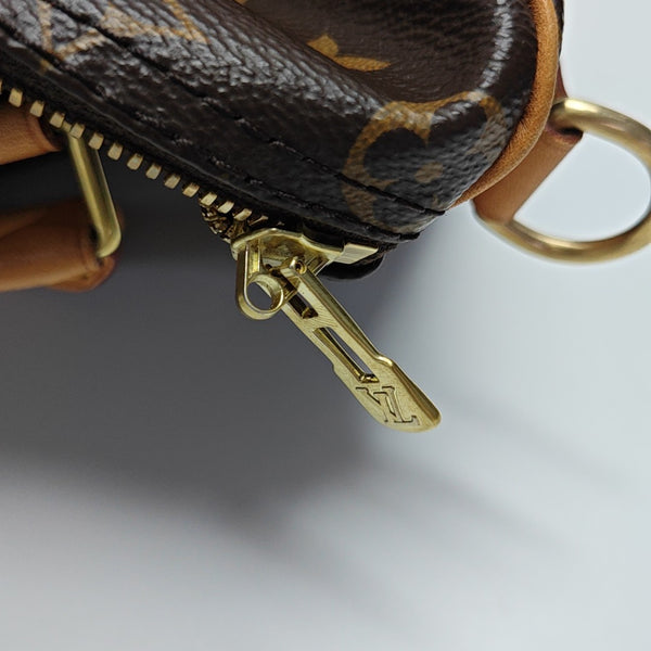 SPEEDY 25 Monogram Coated Canvas Brown