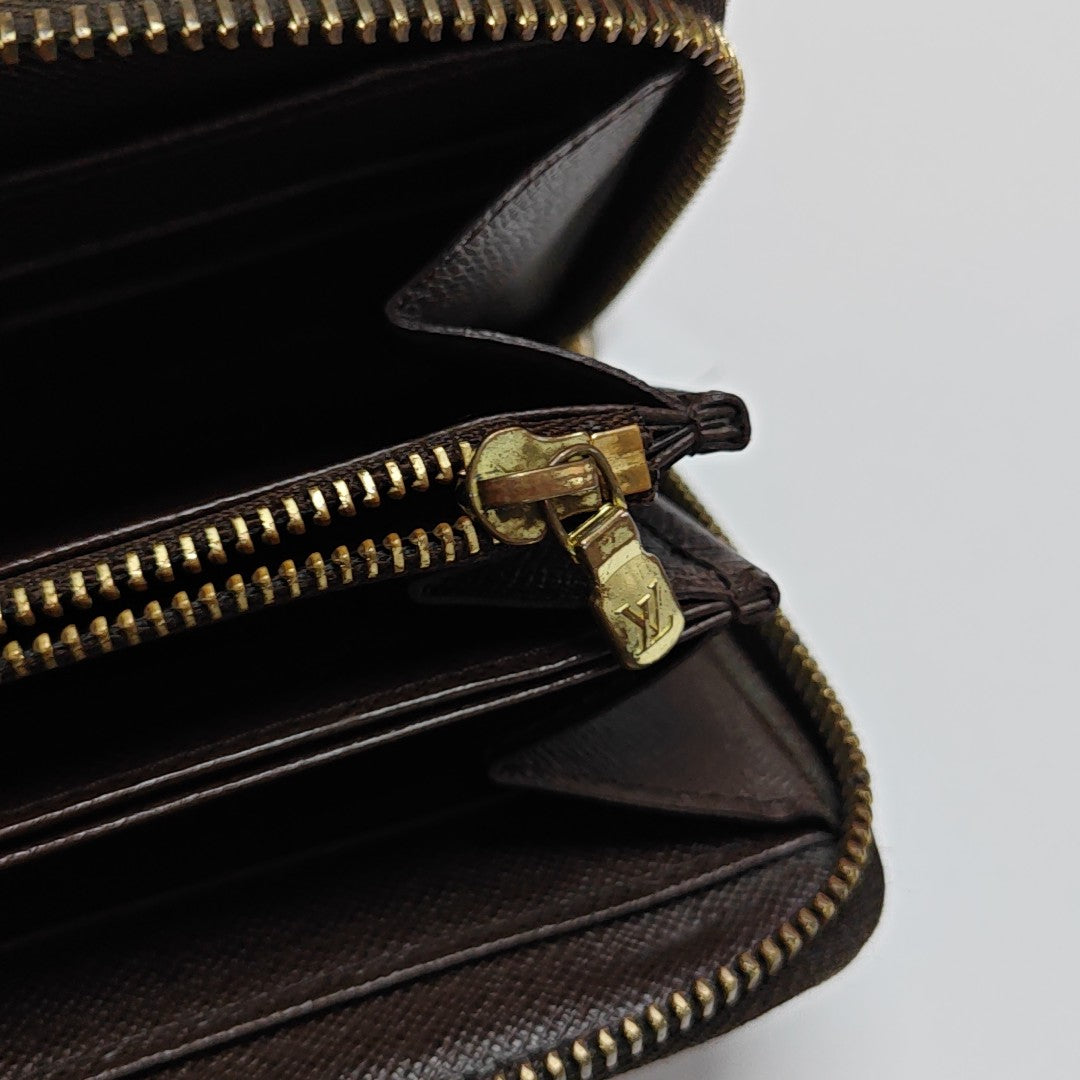 ZIPPY Damier Ebene Coated Canvas Brown Wallet