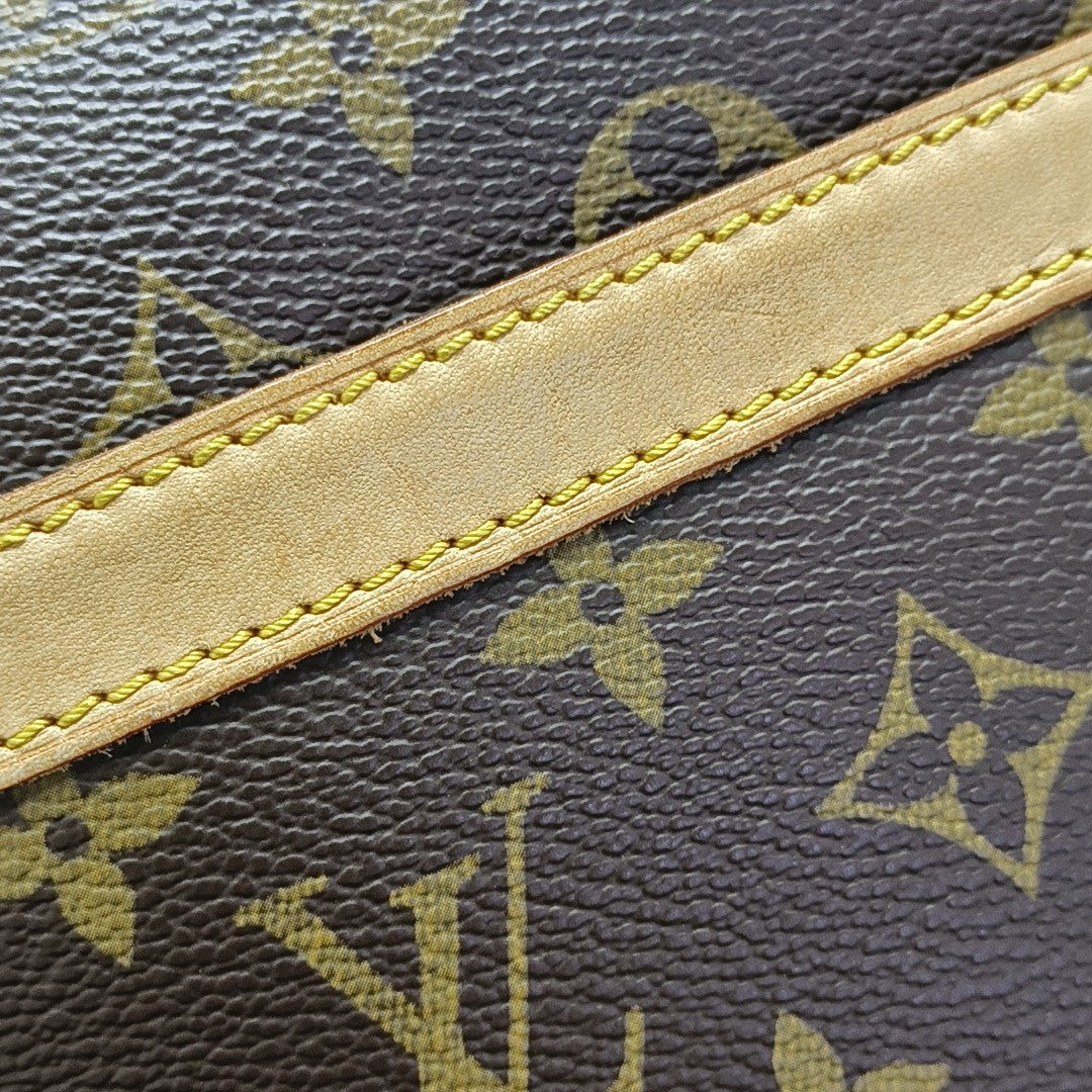 REPORTER PM Monogram Coated Canvas Brown