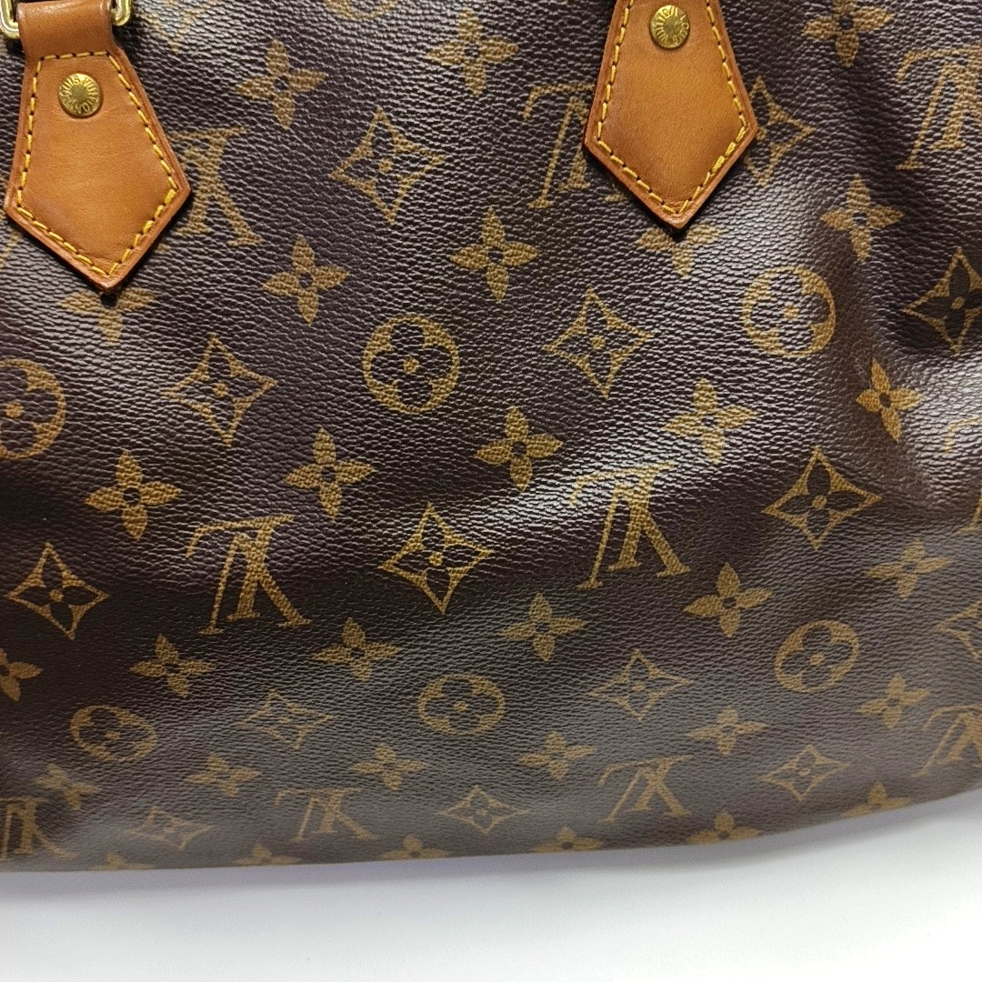 SPEEDY 30 Monogram Coated Canvas Brown