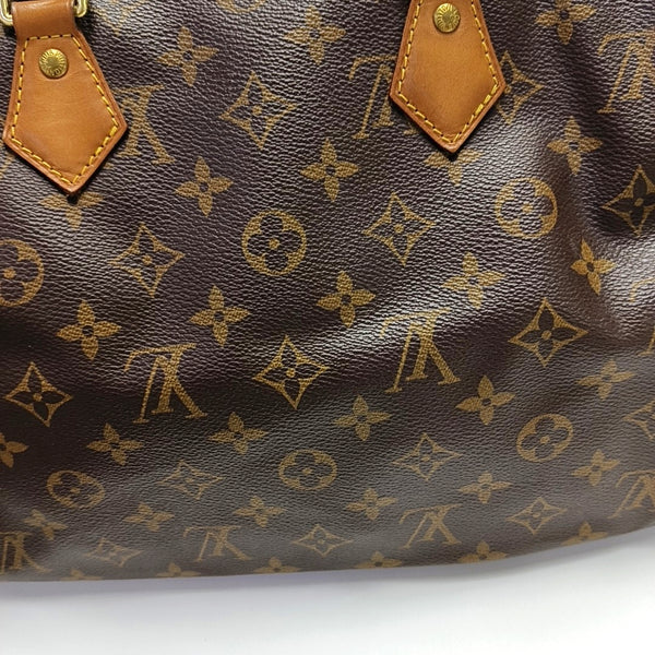 SPEEDY 30 Monogram Coated Canvas Brown