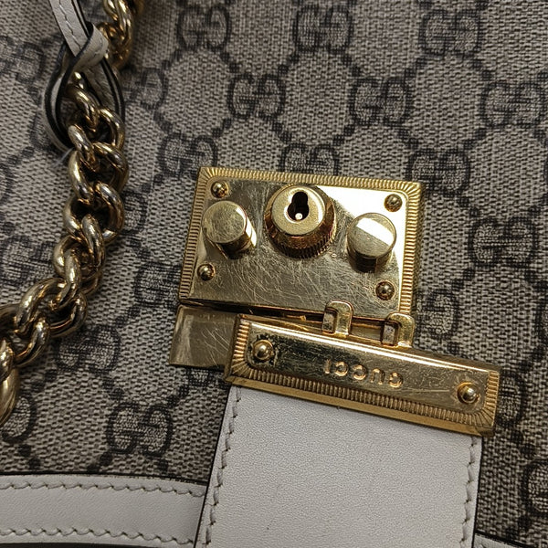 Padlock Small Monogram Coated Canvas Beige