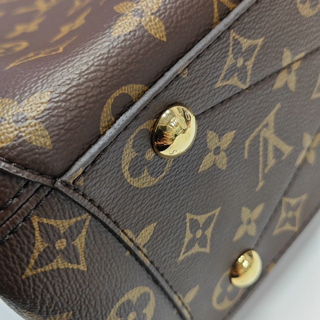 MONTAIGNE MM Monogram Coated Canvas Brown