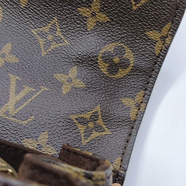 MÉTIS EAST WEST Monogram Coated Canvas Brown