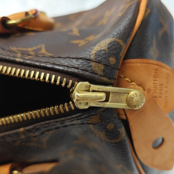 Authenticated pre-owned  SPEEDY 25 Monogram Coated Canvas Brown - Top Handle Bag at Looply
