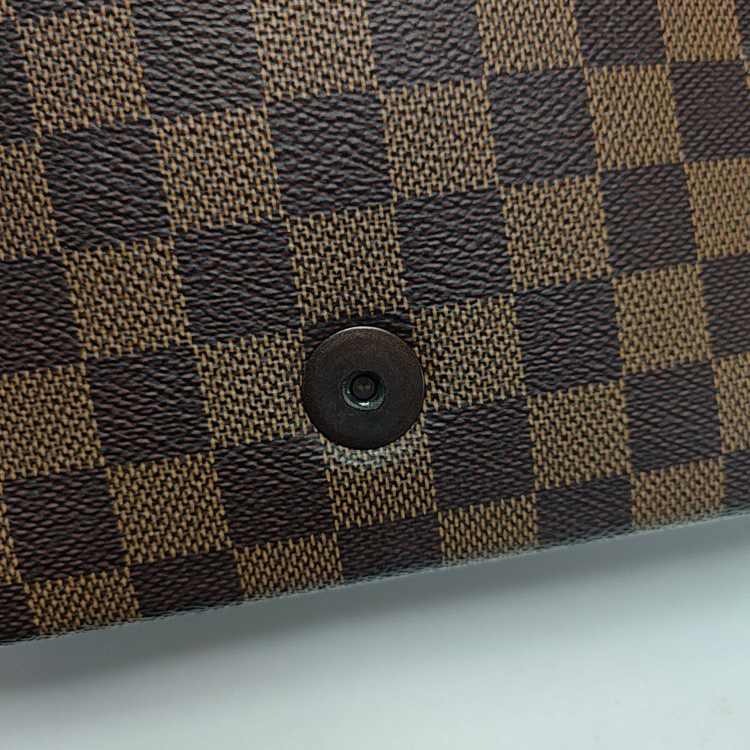 TRIBECA Damier Ebene Coated Canvas Brown