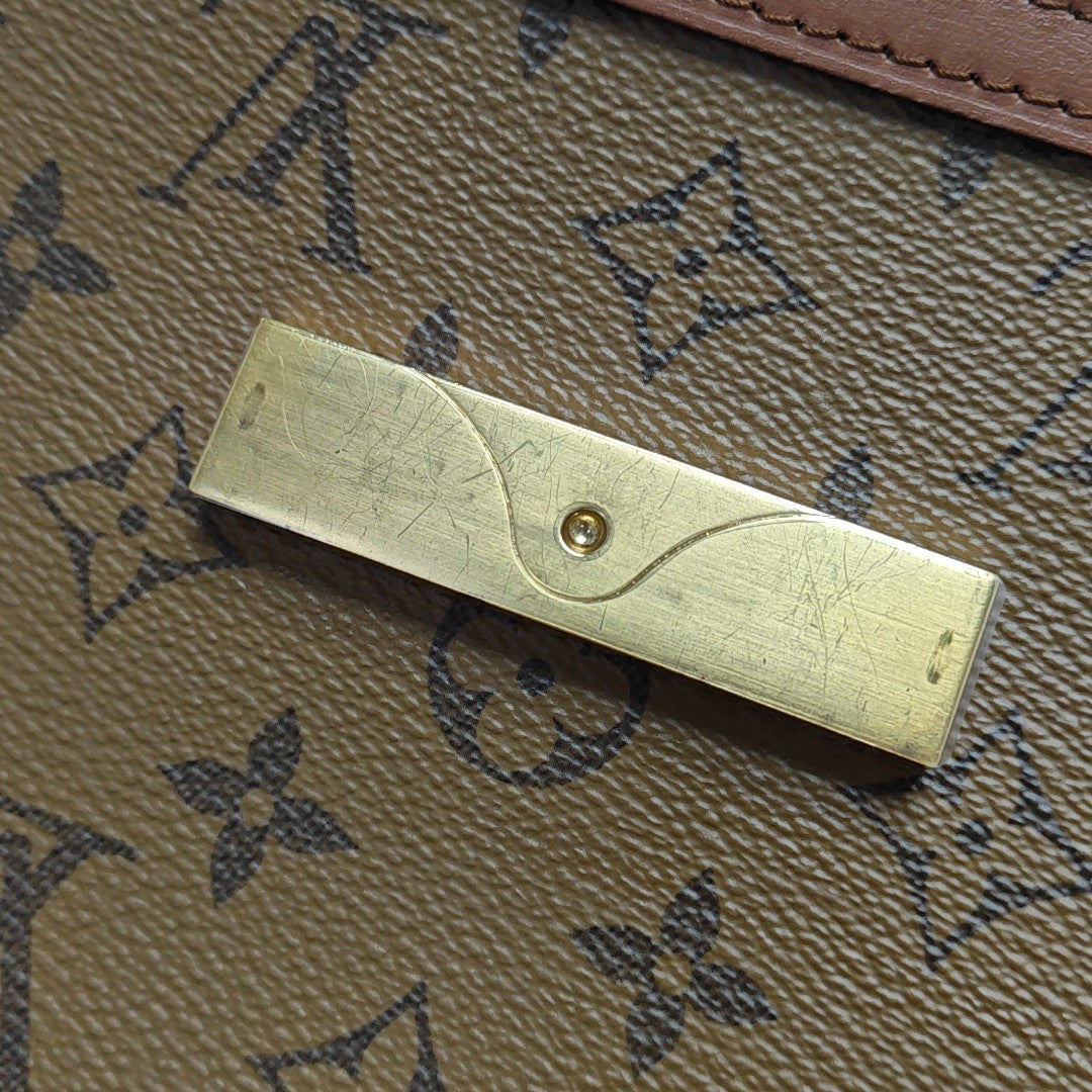 DAUPHINE MM Monogram Coated Canvas Brown
