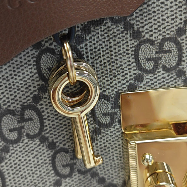 Padlock Medium Monogram Coated Canvas Beige