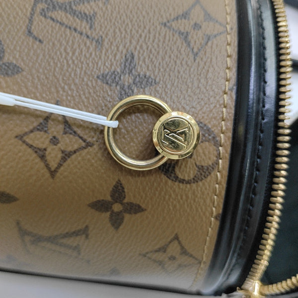 CANNES PM Monogram Coated Canvas Brown