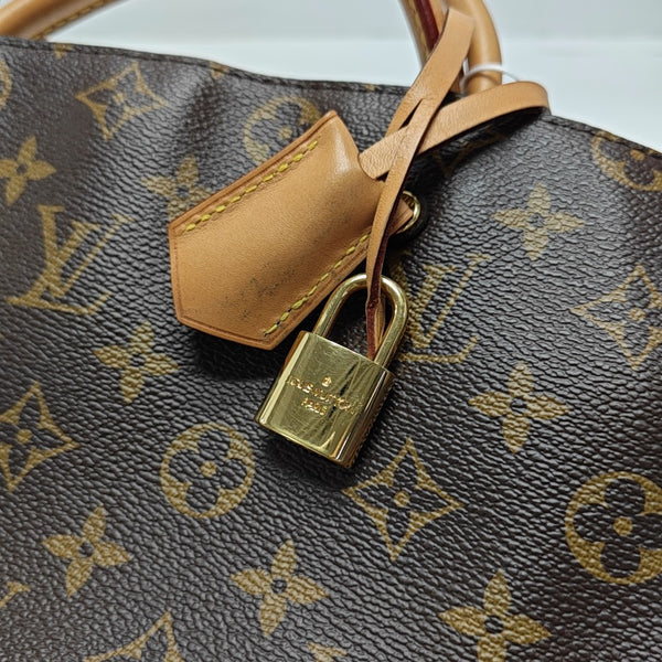 MONTAIGNE GM Monogram Coated Canvas Brown
