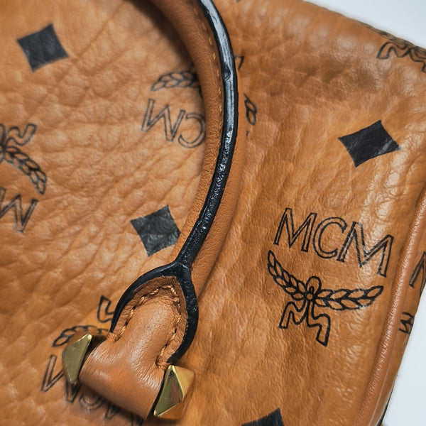 ESSENTIAL Monogram Coated Canvas Brown