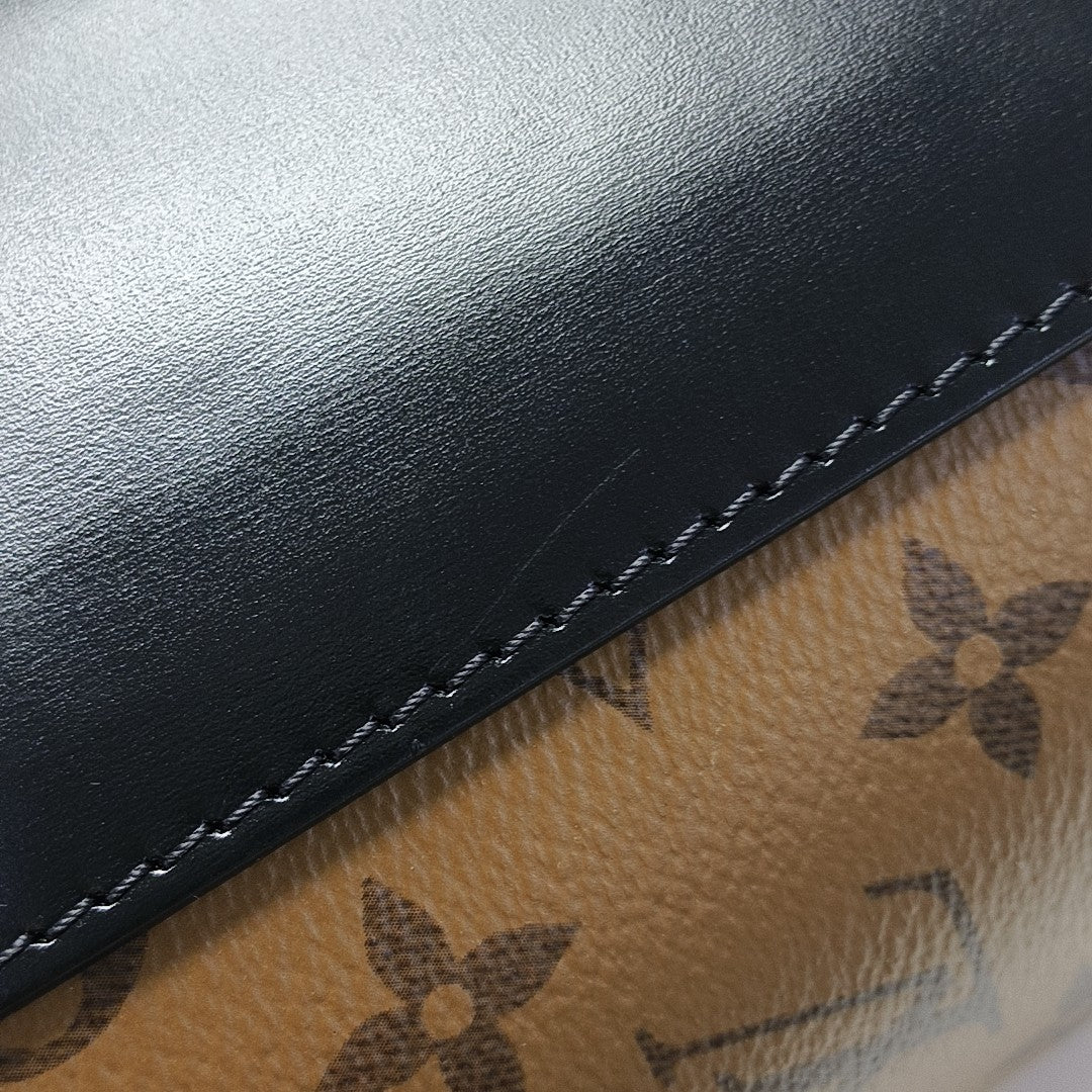 CANNES PM Monogram Coated Canvas Brown