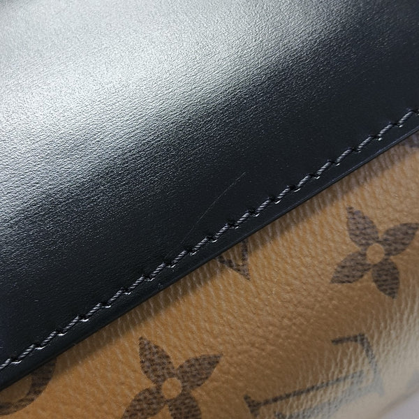 CANNES PM Monogram Coated Canvas Brown