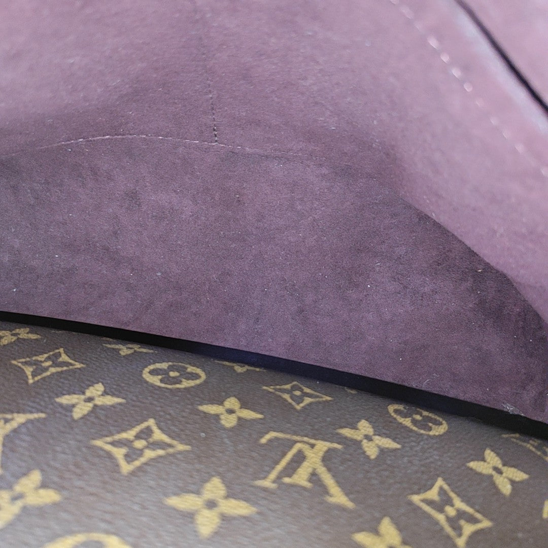 MONTAIGNE GM Monogram Coated Canvas Brown