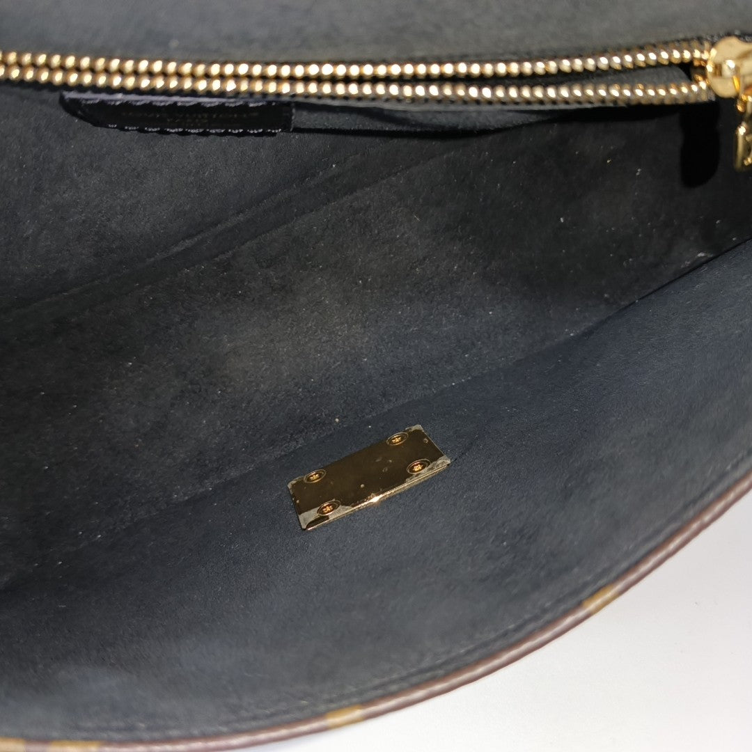 TRUNKIE Monogram Coated Canvas Brown