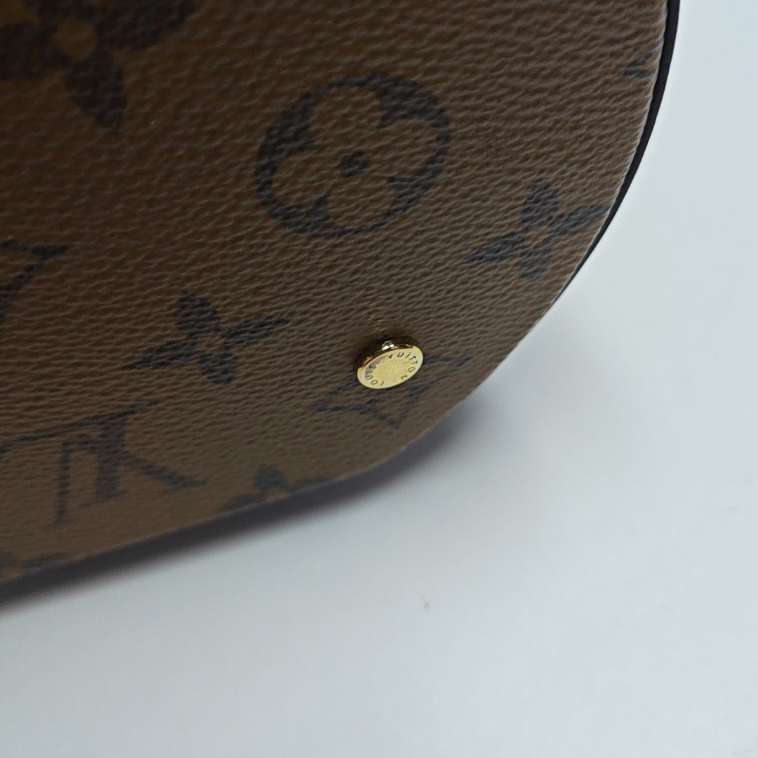 CANNES PM Monogram Coated Canvas Brown