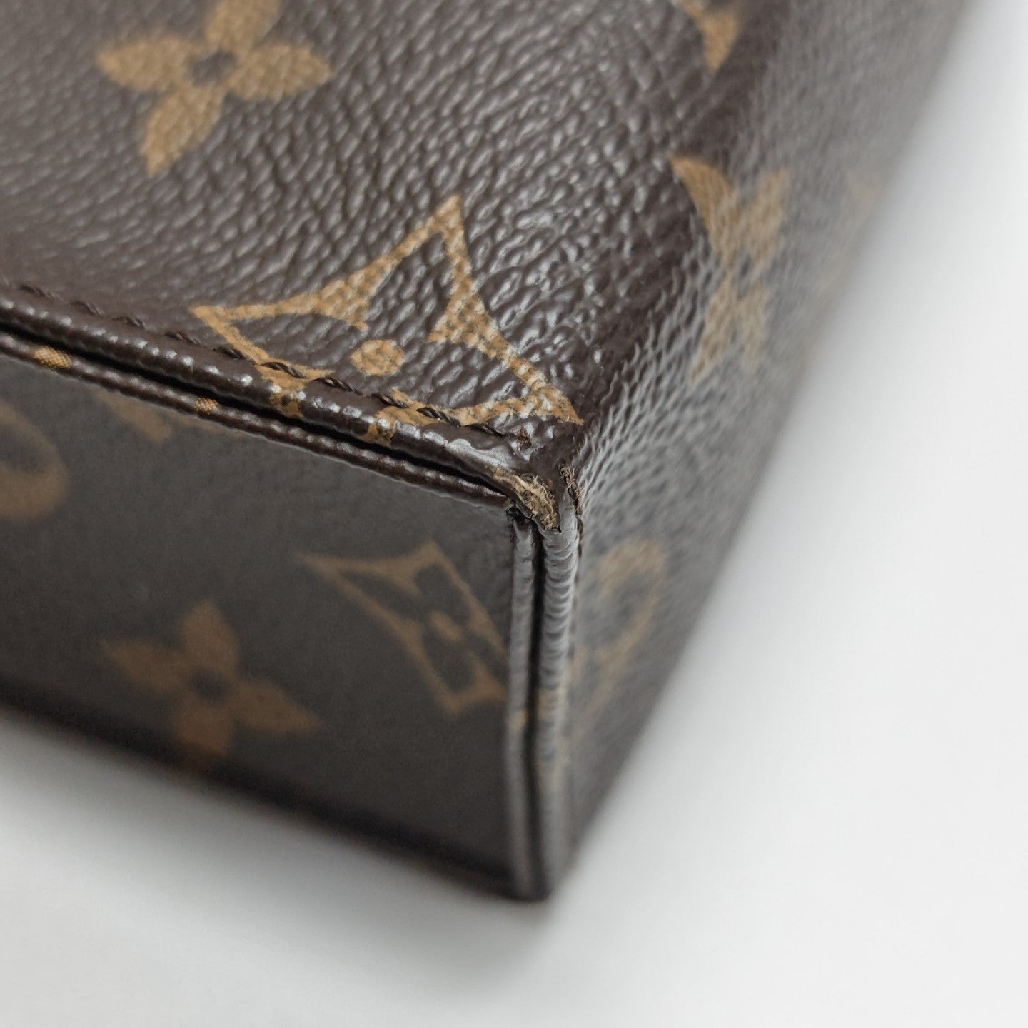TOILET POCKET 26 Monogram Coated Canvas Brown