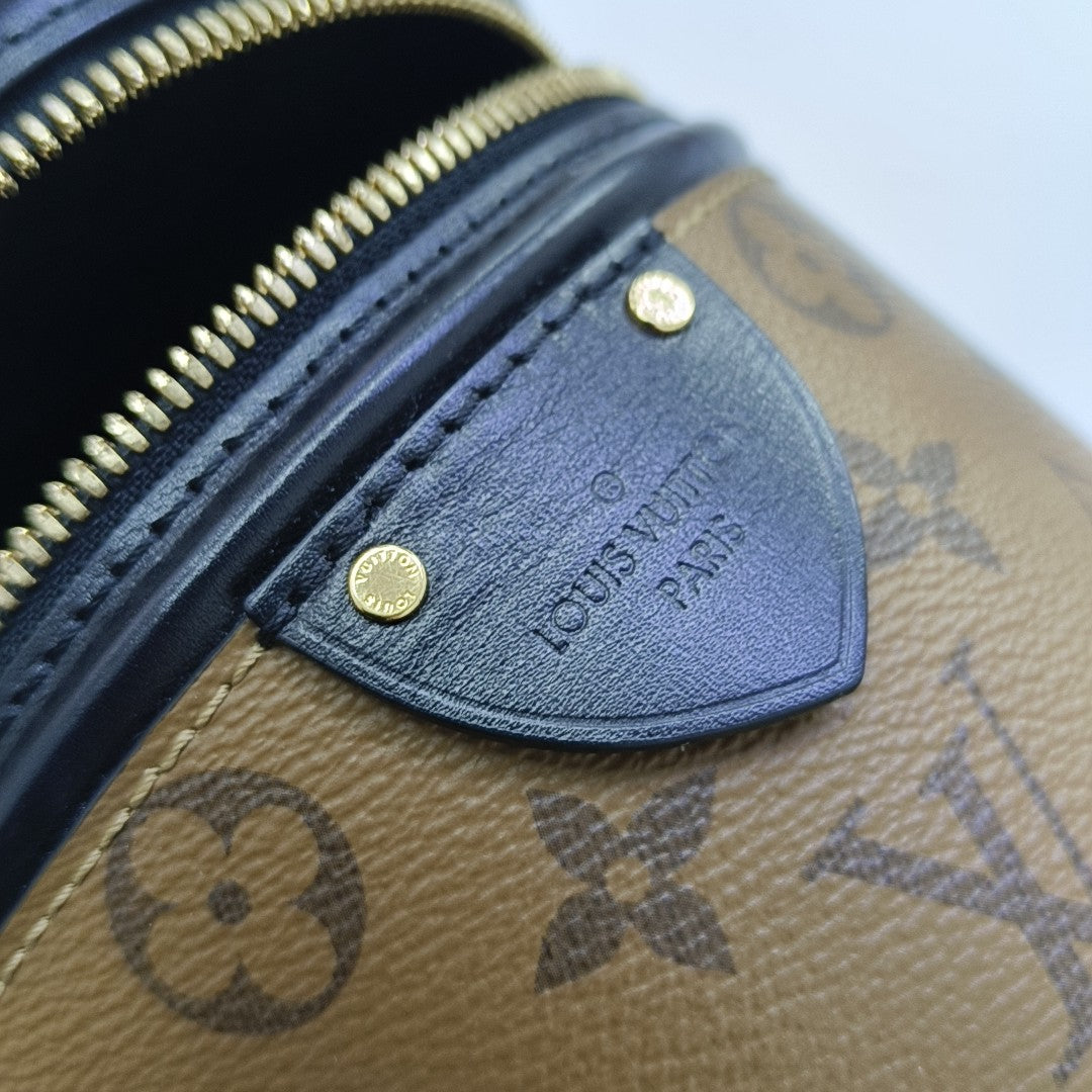 CANNES PM Monogram Coated Canvas Brown