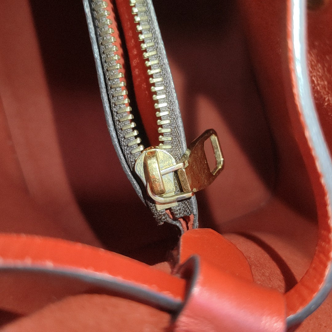 NÉONOÉ MM Monogram Coated Canvas Brown