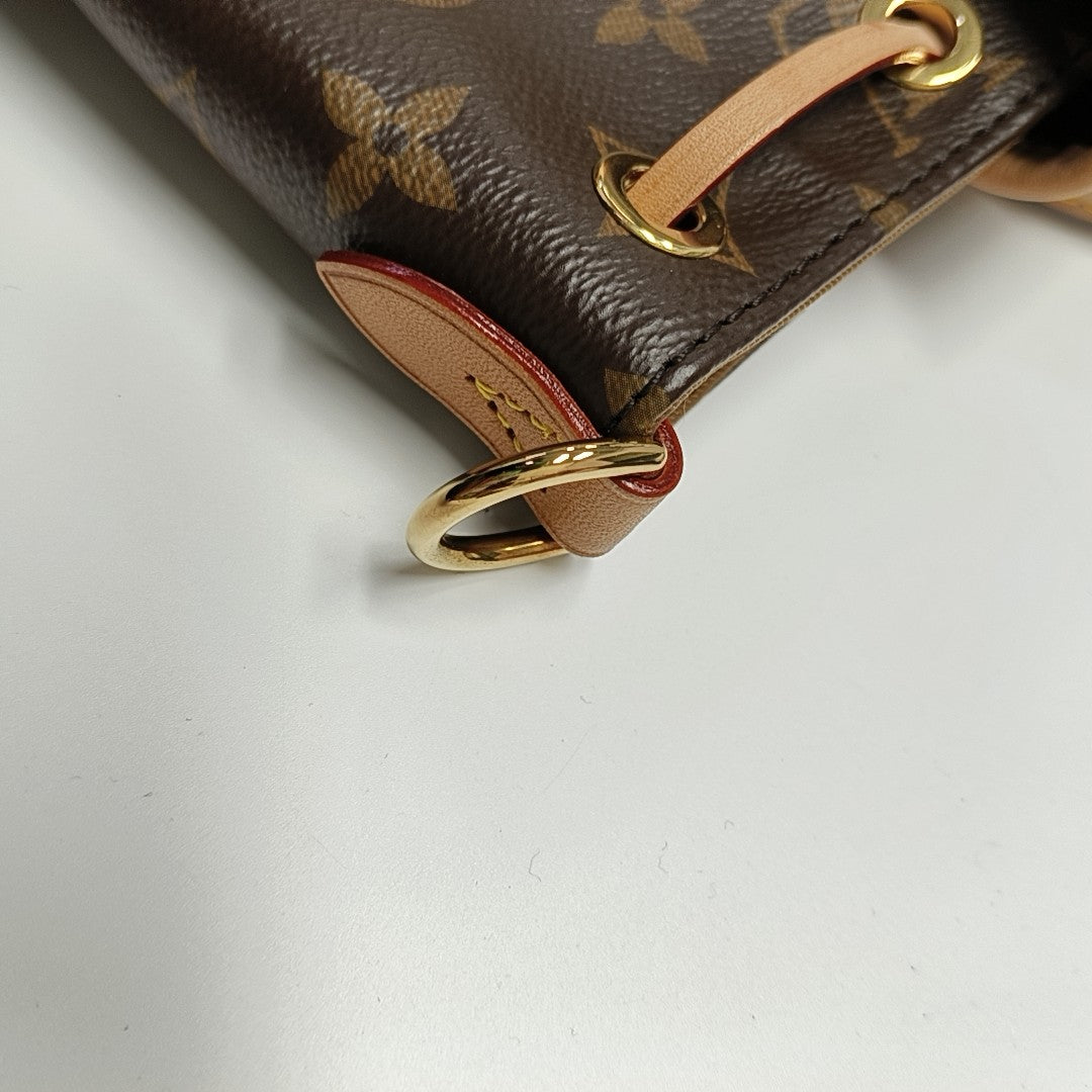 EXCURSION PM Monogram Coated Canvas Brown