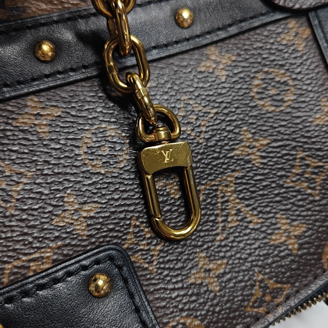 TRUNK Monogram Coated Canvas Brown