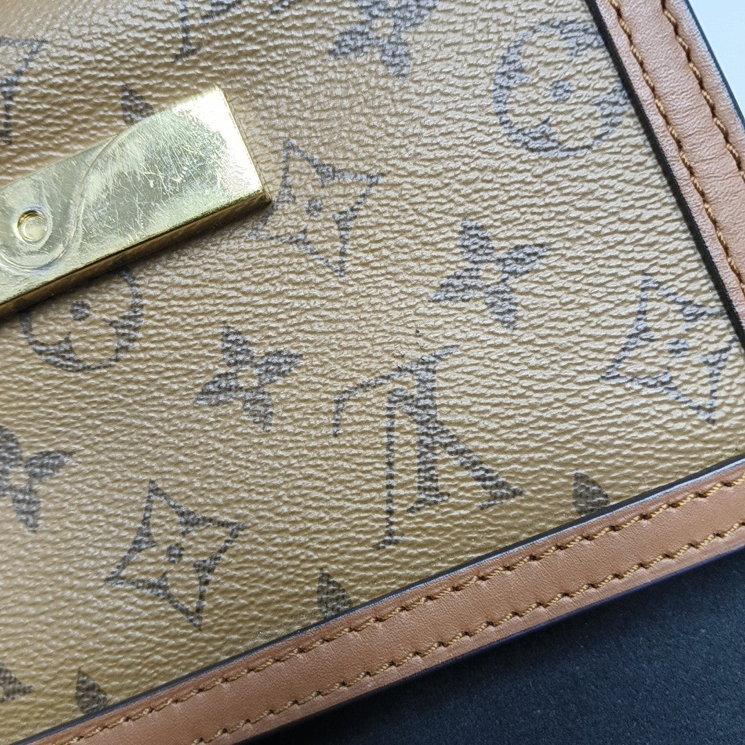 DAUPHINE Mini Monogram Coated Canvas Brown