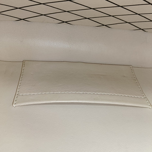 PETITE MALLE Monogram Coated Canvas Brown