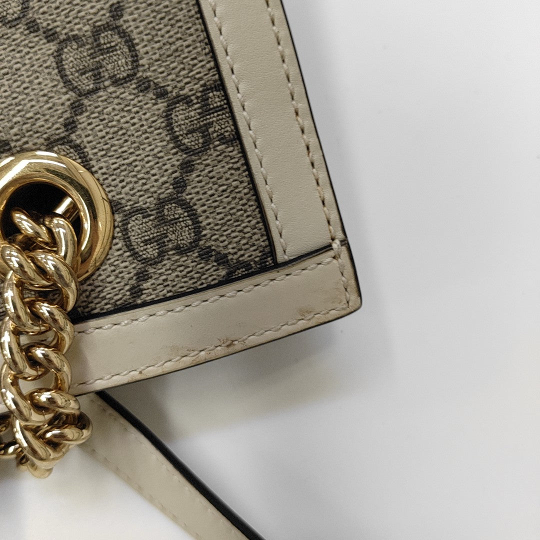 Padlock Small Monogram Coated Canvas Beige