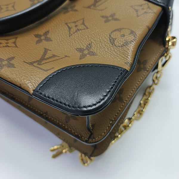 PETITE MALLE Monogram Coated Canvas Brown