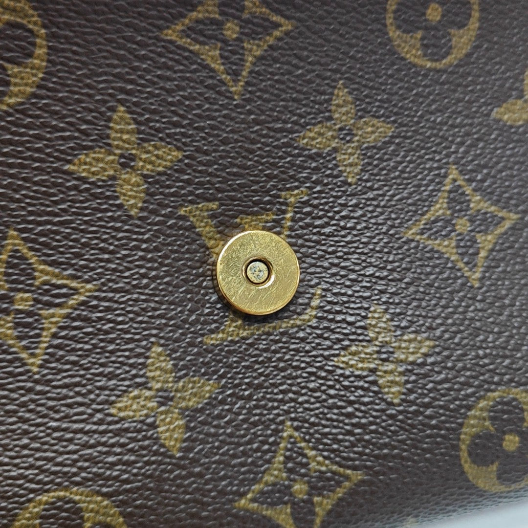 TWIN GM Monogram Coated Canvas Brown
