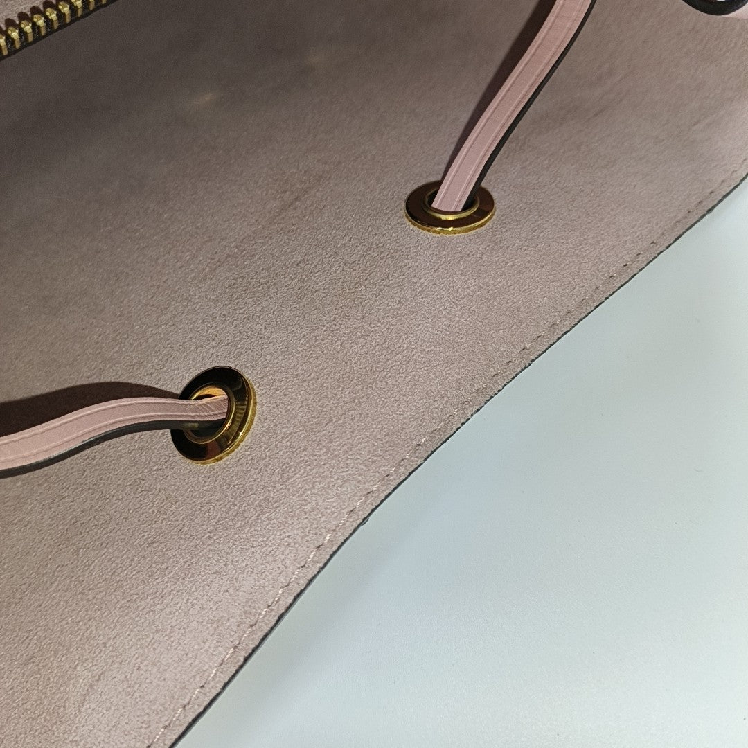 NÉONOÉ MM Monogram Coated Canvas Brown
