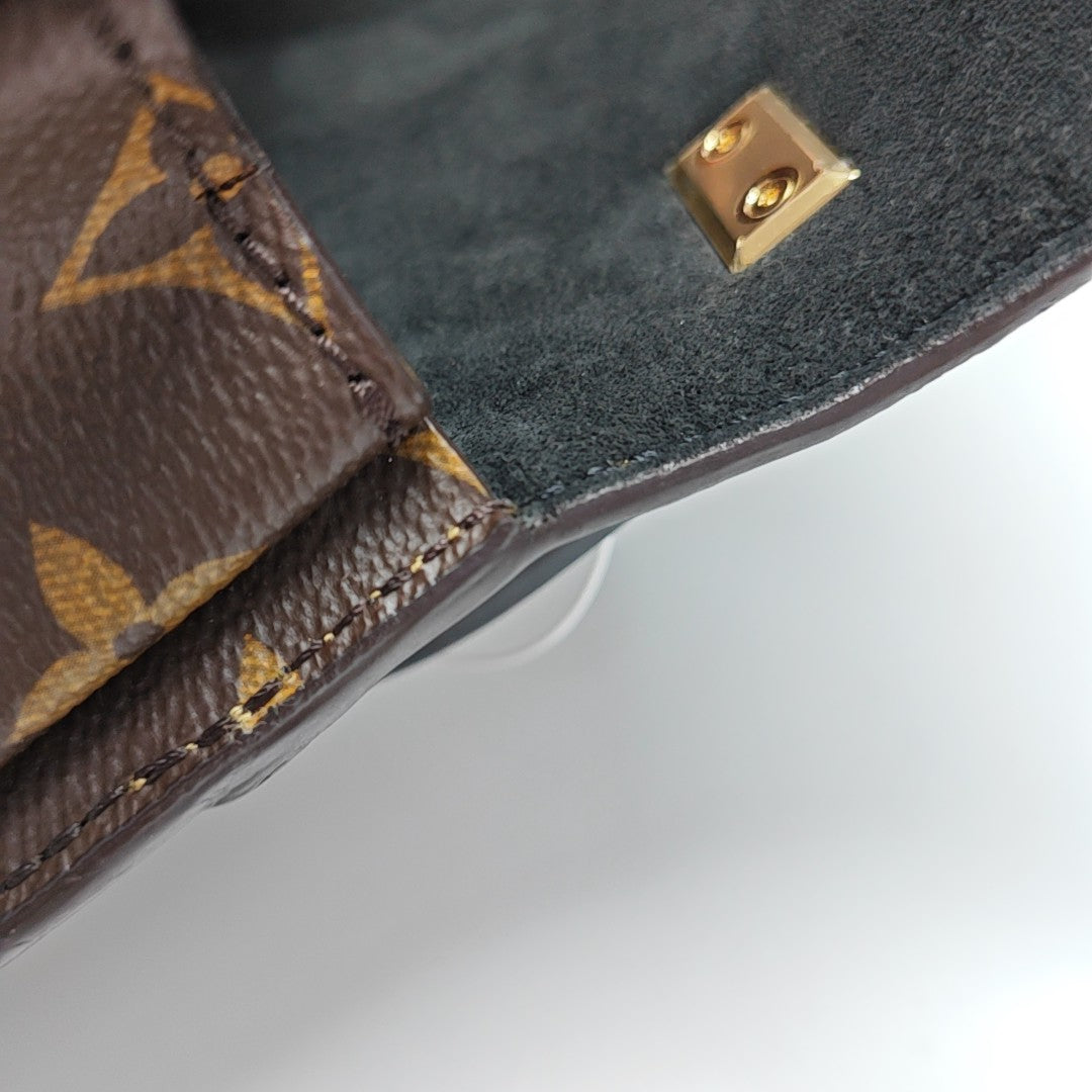 EDEN Monogram Coated Canvas Brown