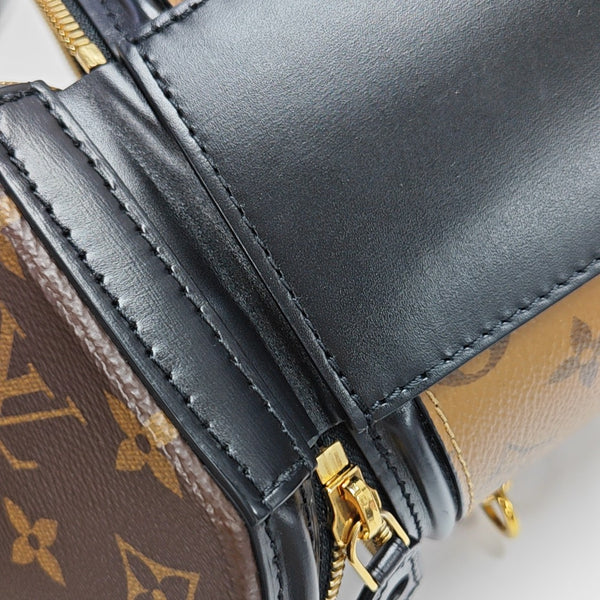 CANNES PM Monogram Coated Canvas Brown