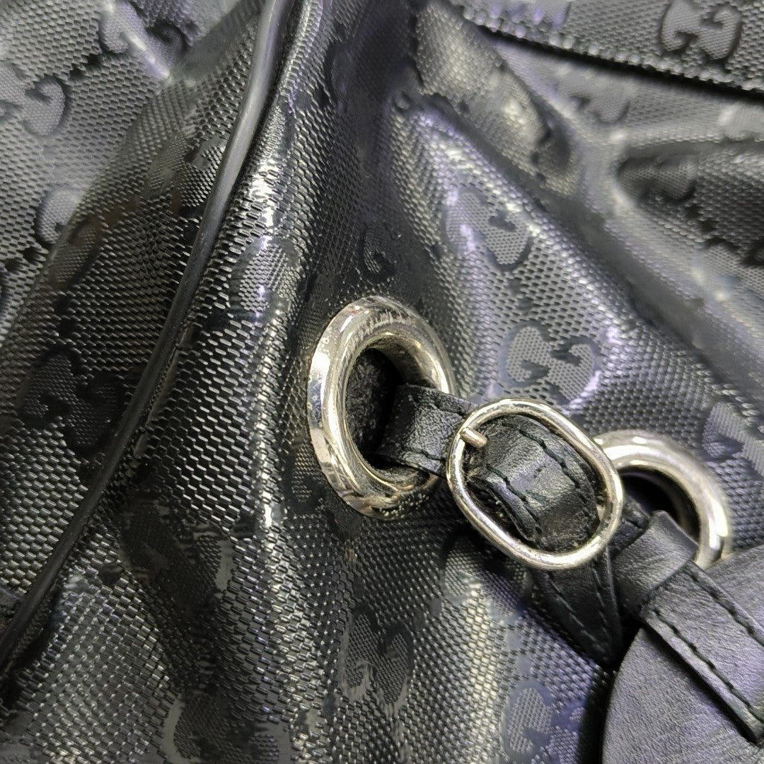 Monogram Coated Canvas Backpack Black