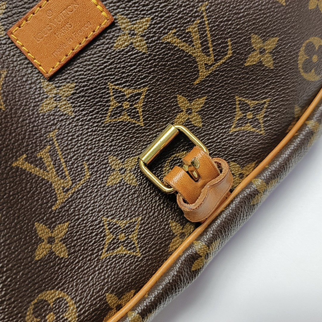 SAUMUR Monogram Coated Canvas Brown