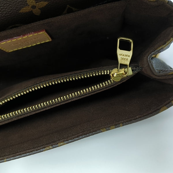 MÉTIS EAST WEST Monogram Coated Canvas Brown