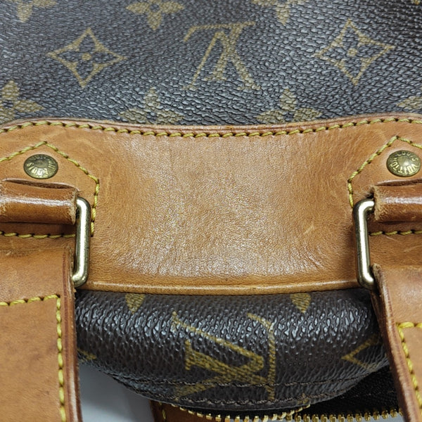 EXCURSION Monogram Coated Canvas Brown