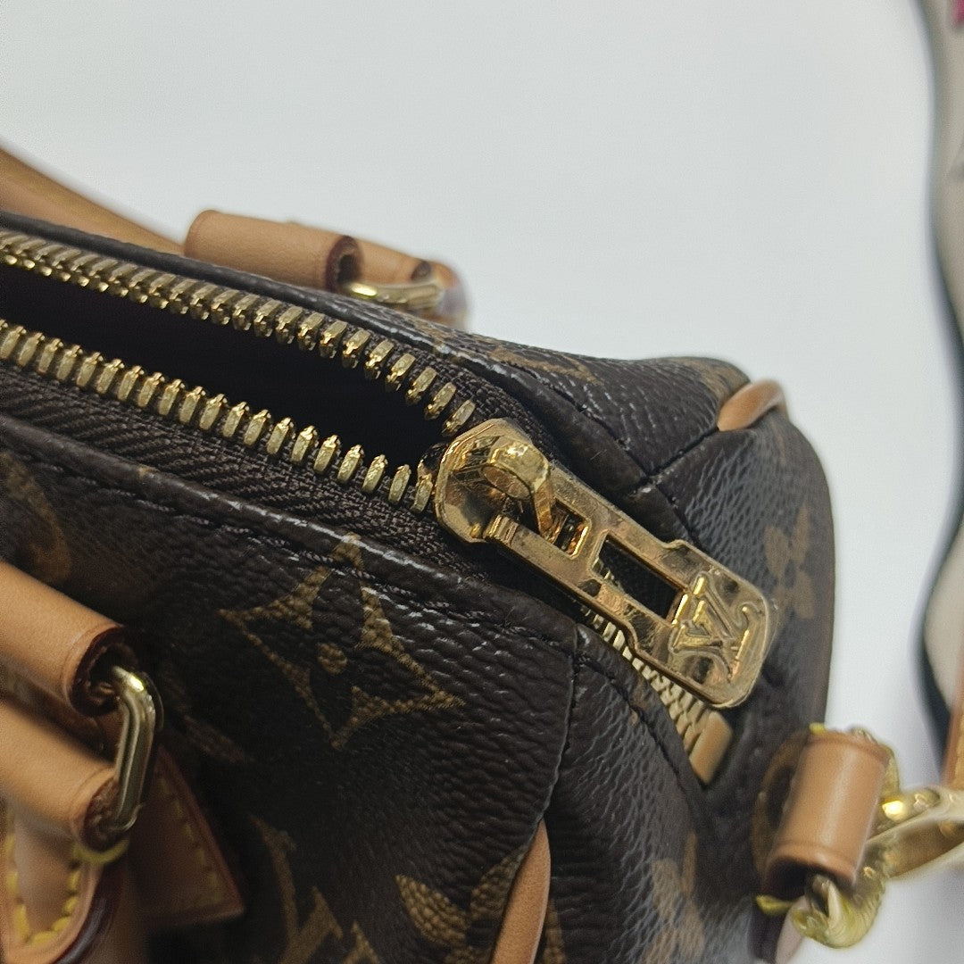 SPEEDY 20 Monogram Coated Canvas Brown