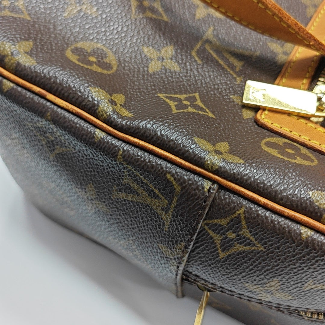 CITE GM Monogram Coated Canvas Brown