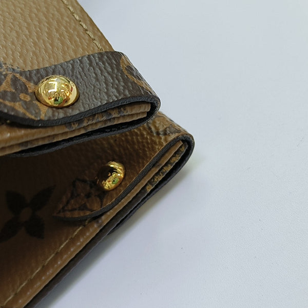 ONTHEGO MM Monogram Coated Canvas Brown
